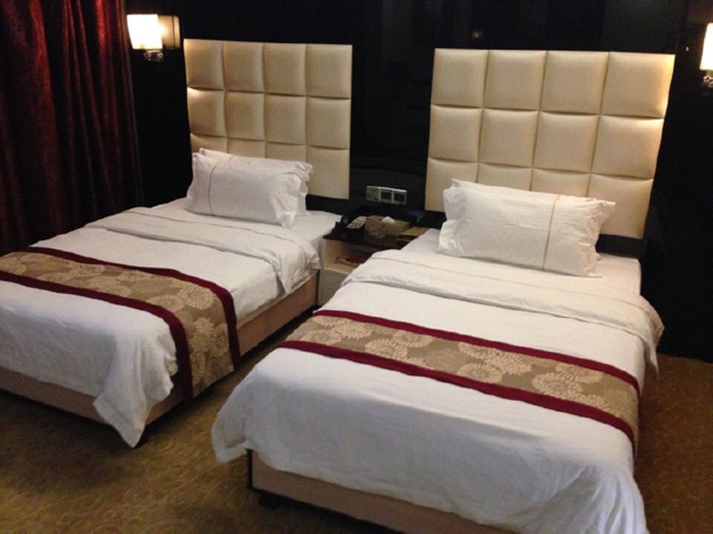Tianguo Times Hotel فوشان الغرفة الصورة