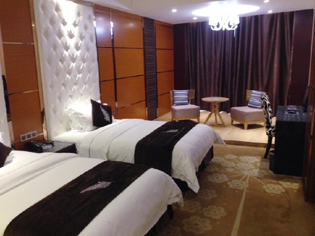 Tianguo Times Hotel فوشان الغرفة الصورة