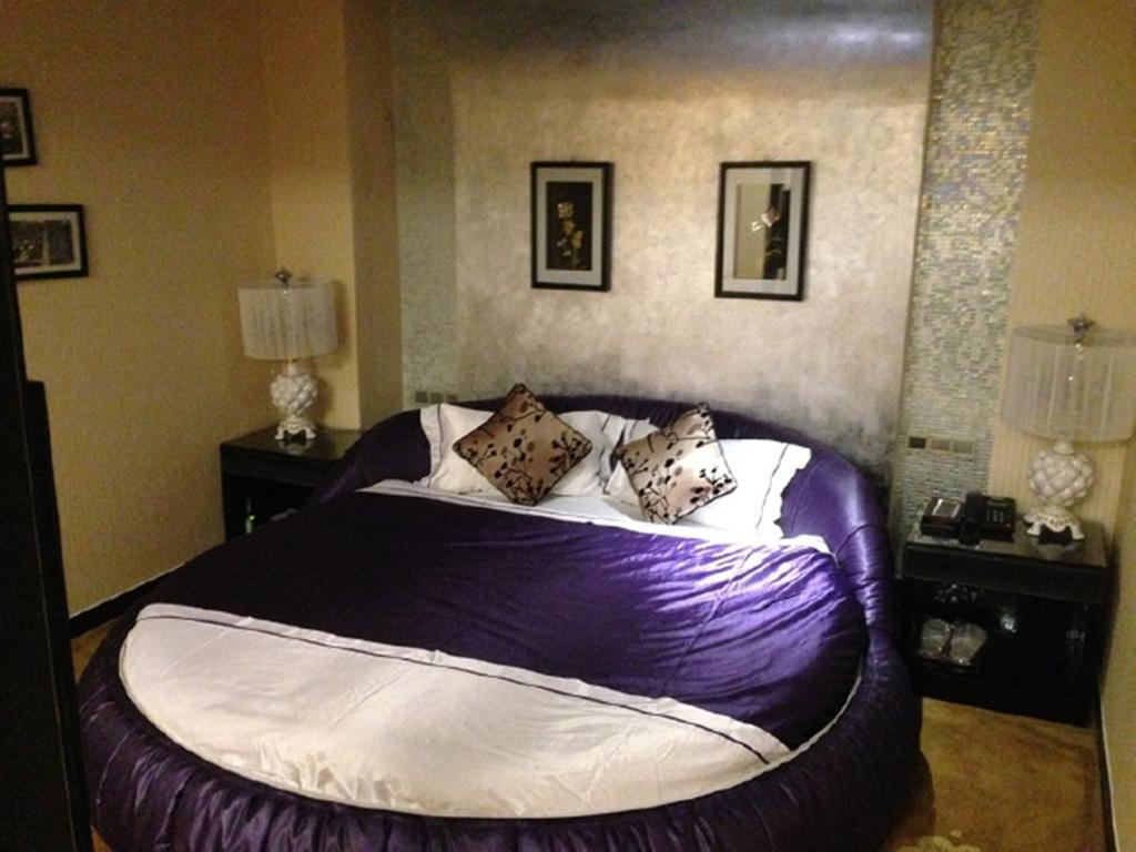 Tianguo Times Hotel فوشان الغرفة الصورة