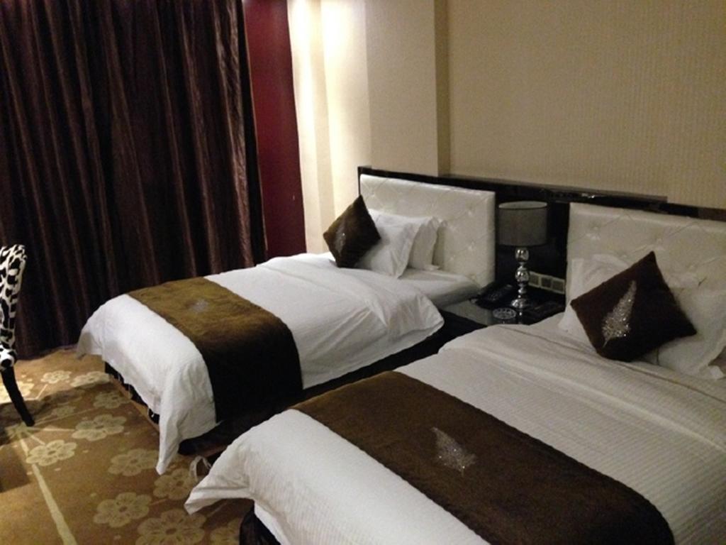 Tianguo Times Hotel فوشان الغرفة الصورة