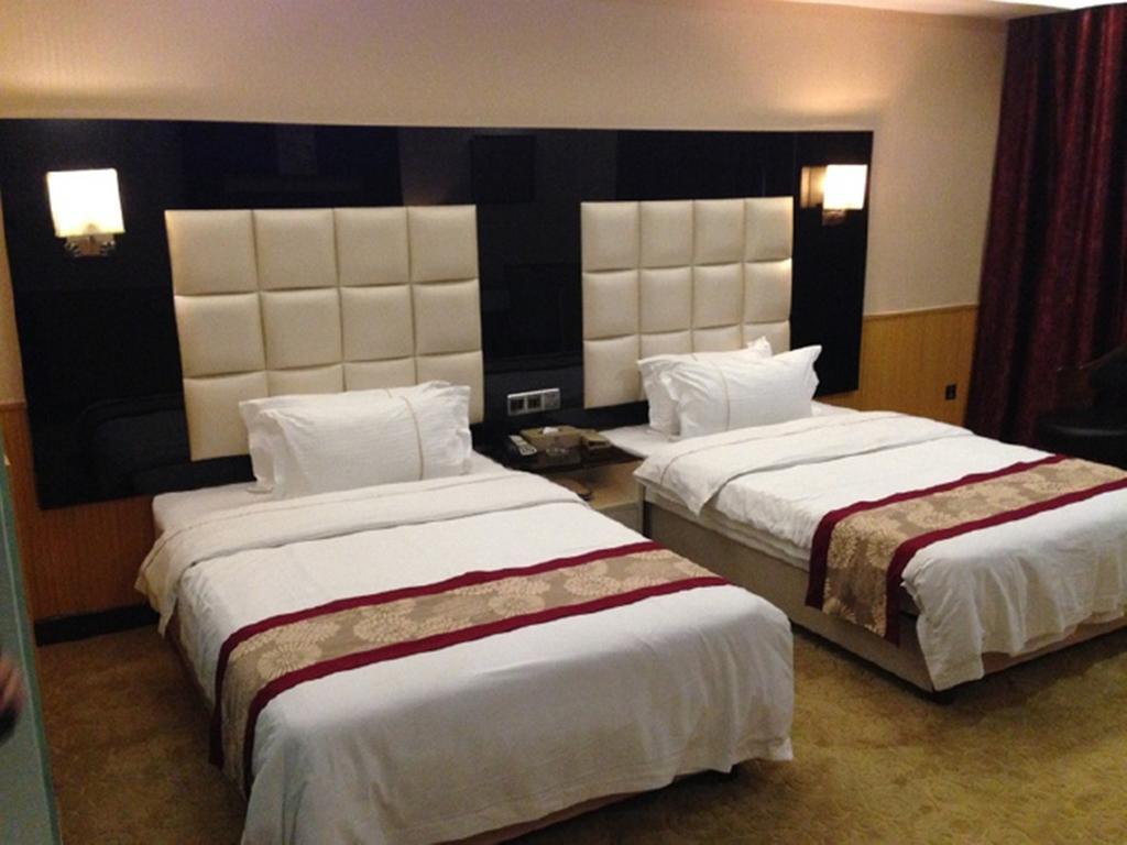 Tianguo Times Hotel فوشان الغرفة الصورة