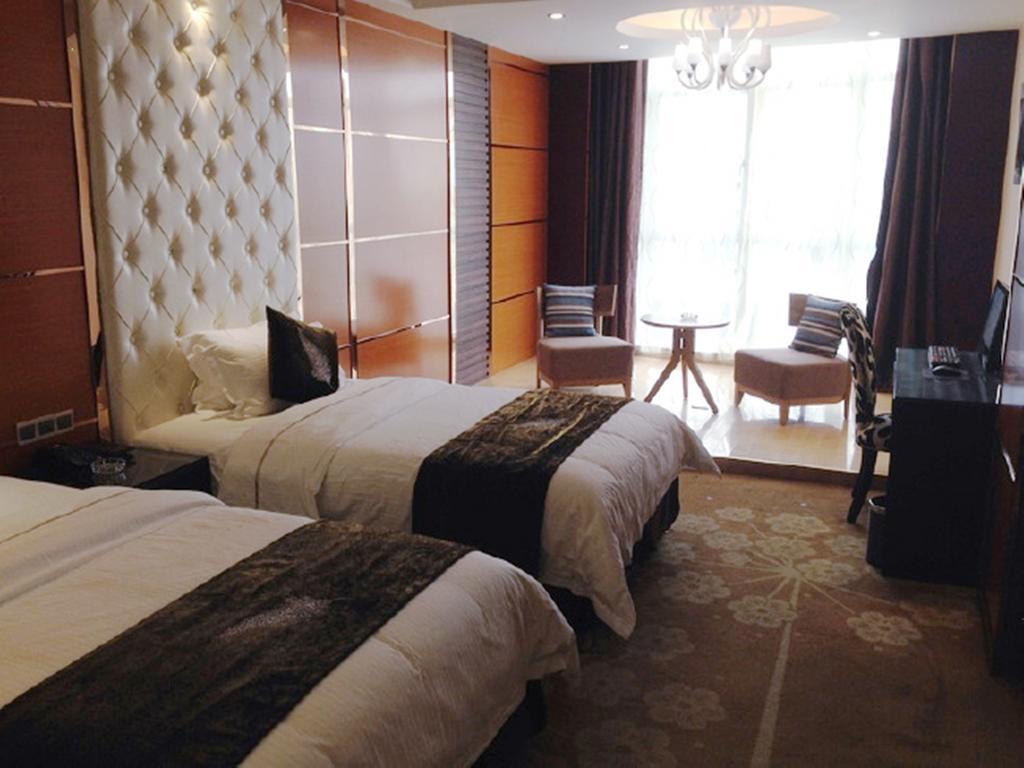 Tianguo Times Hotel فوشان الغرفة الصورة