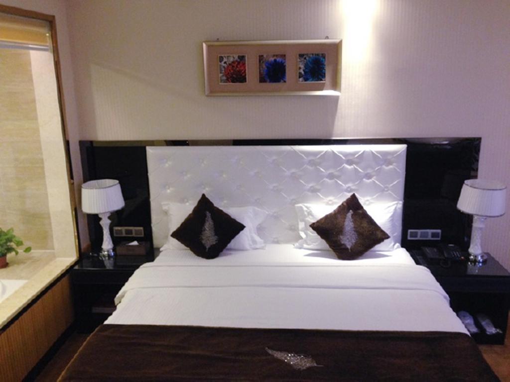Tianguo Times Hotel فوشان الغرفة الصورة