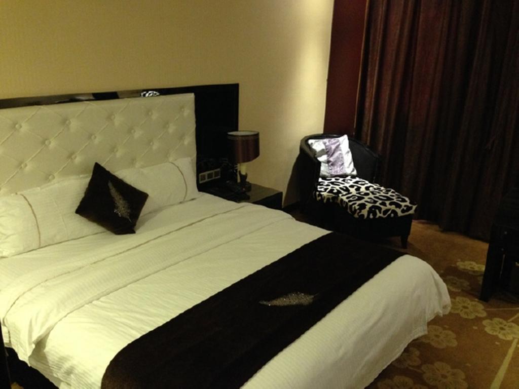 Tianguo Times Hotel فوشان الغرفة الصورة